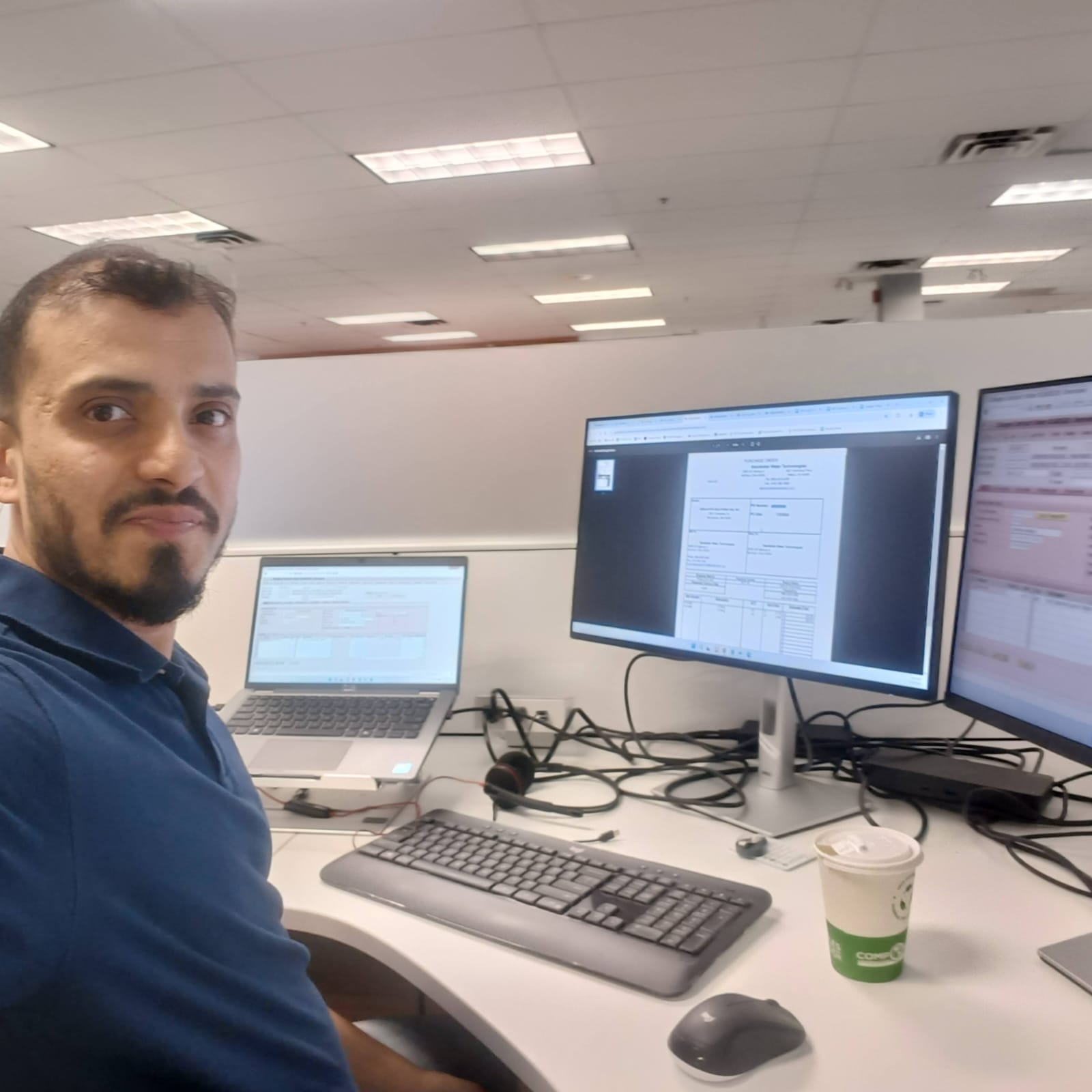 Saud, the founder of HeartNight, working late at his desk